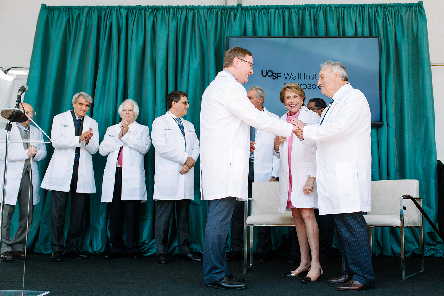 Sam Hawgood, Joan Weill and Sandy Weill on stage during an April event launching the UCSF Weill Institute for Neurosciences